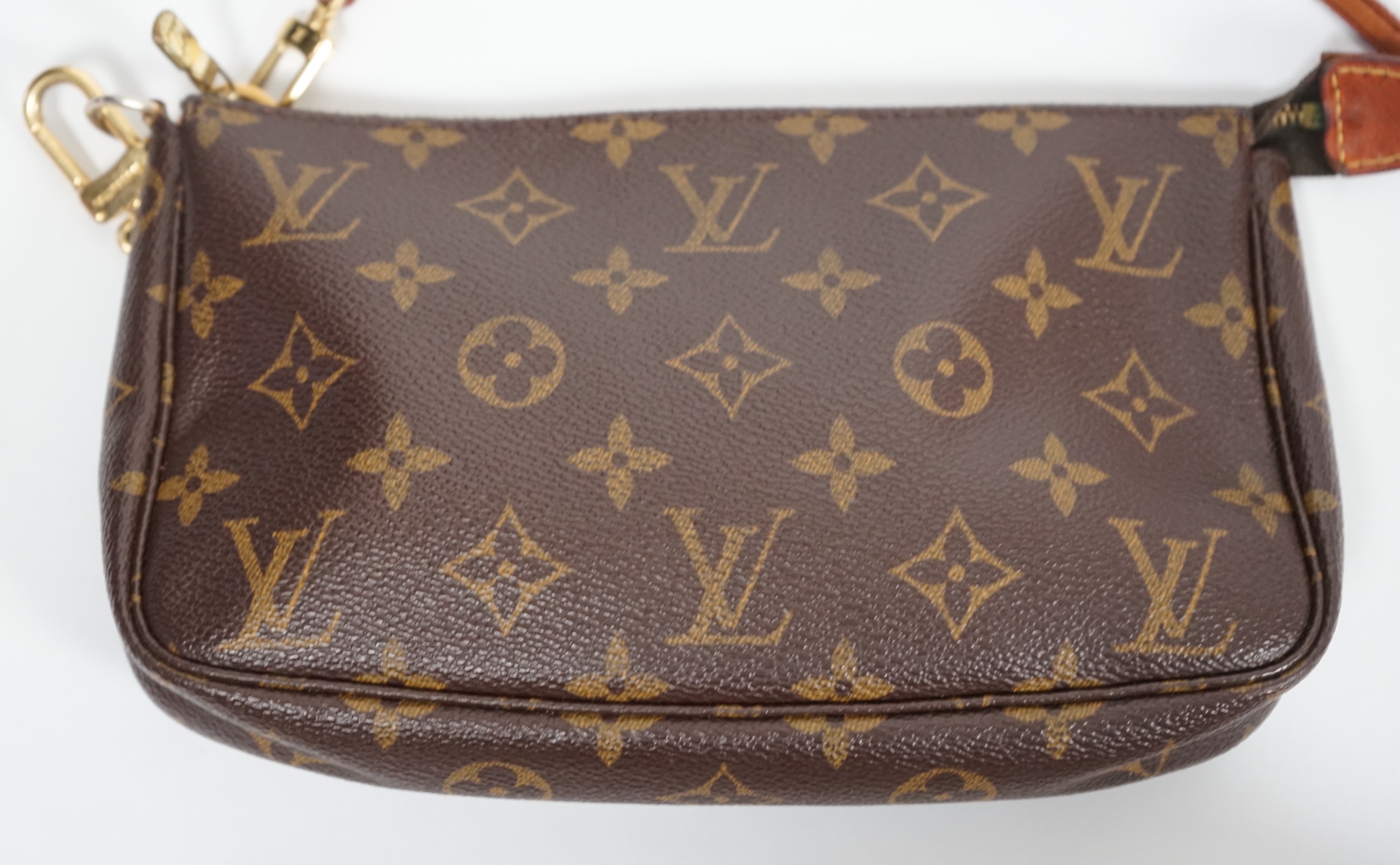 A vintage Louis Vuitton Monogram canvas Speedy 25 handbag, a Louis Vuitton Pochette Accessories Canvas bag and small Agenda PM Speedy bag: width 25cm, height overall 29cmm depth15cm, Pochette Bag: width 22cm, height 13cm